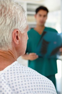 Young doctor with senior patient