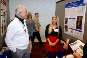 Figure Two: Students from Southeast High School presenting at a poster session at the 2016 Family Medical Education Consortium in Pittsburgh. 